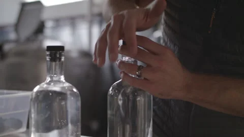 A man filling a bottle Video stock 137677653