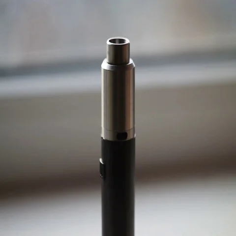 Man filling an electronic cigarette with e-juice. Man detaching the reservoir Stock Footage 69446868