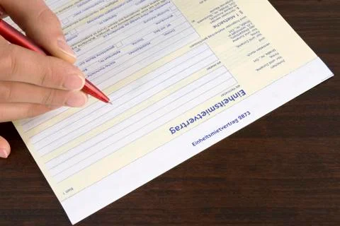Man filling in form, close-up, elevated view Stock Photos