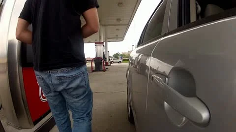 Man filling his car up with gas.mp4 Stock Footage