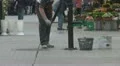 Man filling up his pail with fresh water HD Footage