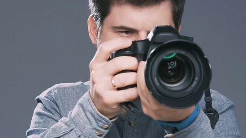 Man filming something on camera Stock Footage 91188632