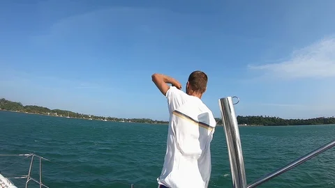 A man films Catamaran Video stock 126776352