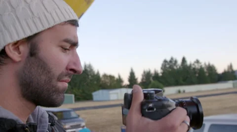 Man films hot air balloons being prepared Stock Footage 59170372