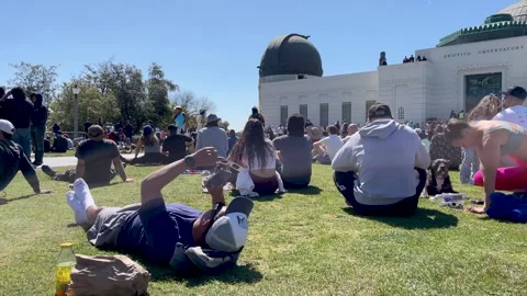 Man Films Solar Eclipse at the Griffith Observatory in Los Angeles Stock Footage 271313009