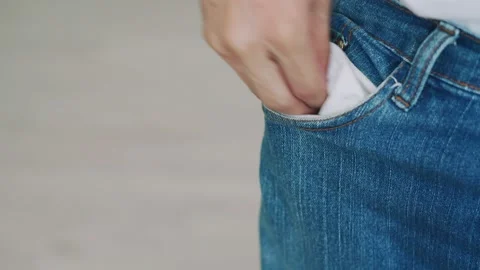 A man is in financial problem makes show no money in pocket. Economic problem 動画素材 154315688