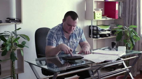 Man finds a calculator Stock-Footage 62728102