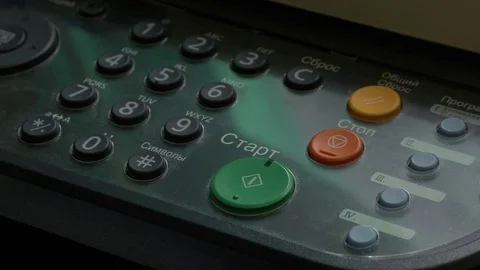 Man Finger Dials The Numbers On MFP Stock Footage 76757417