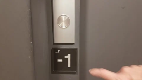 Man Finger Hand Pushing Elevator Button in -1 garage Office Center or Video stock 267000803