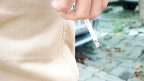 Man finger holding cigarette Stock Footage
