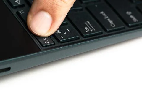 A man finger on keyboard press button Stock Photos