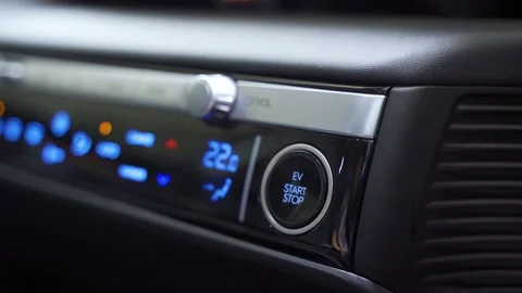 Man finger press a button to turn on of car engine Stock Footage 205908999