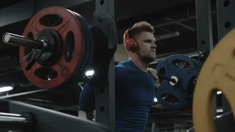 Man finished the exercise with the barbell. Slow motion video Stock Footage 88677096