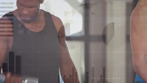 Man finishing bicep curls using chrome dumbbell under windows and partner Stock-Footage 310729189