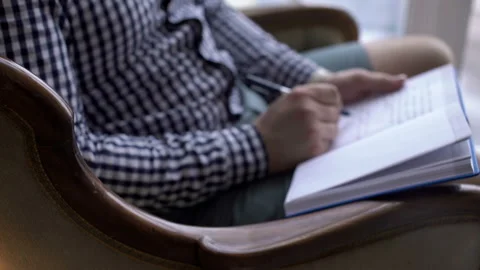 Man finishing his notes Stock Footage 104002758
