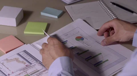 Man finishing his work on checking the documents Stock-Footage 68713547