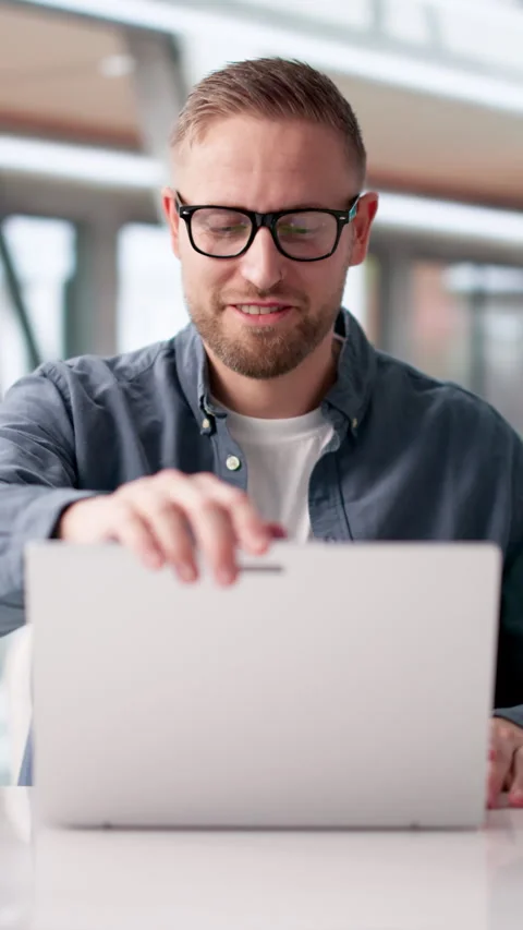Man Finishing His Work Day In Office, Closing Laptop Stock Footage 332496557