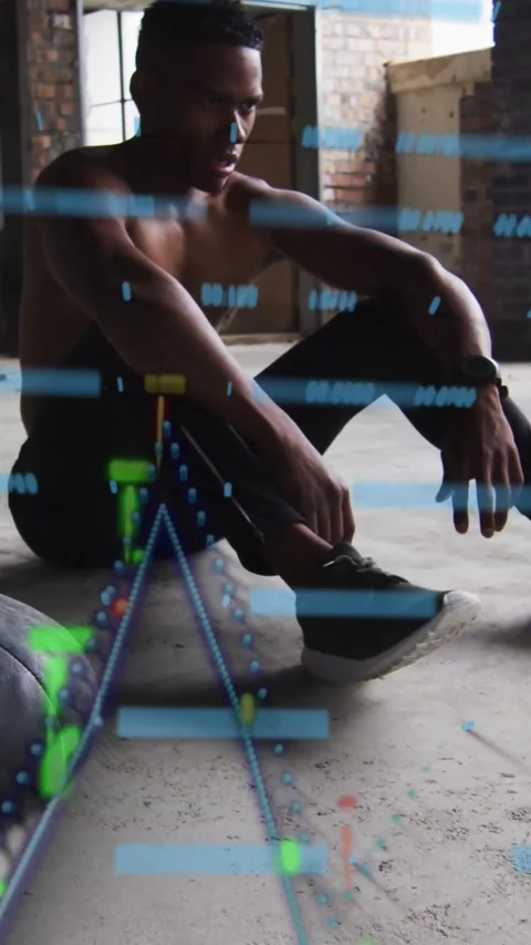Man finishing training set, adjusting shoe on concrete floor, HUD overlaying and Stock Footage 331177928