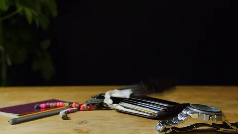 Man finishing Work and throws keys and wallet on table, gets home  Stock Footage 85679520