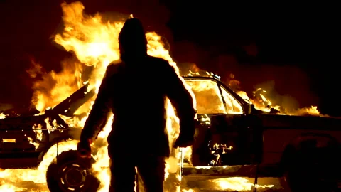 Man On Fire. The Burning Driver. Car Explosion. Stuntman. Slow Motion Stock Footage 87558362