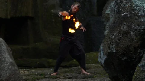 A man with fire in his hands. Stock Footage 113315626