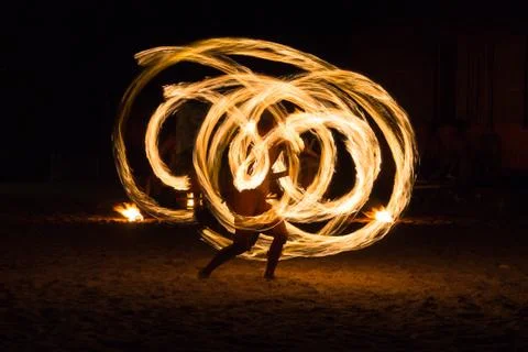 Man Fire Show on the beach Stock Photos