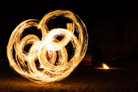 Man Fire Show on the beach Stock Photos