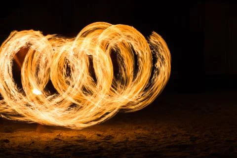 Man Fire Show on the beach Foto stock