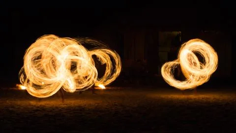 Man Fire Show on the beach Stock Photos