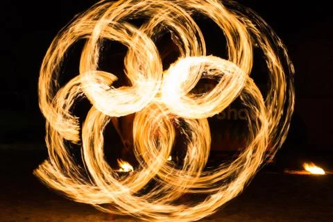 Man Fire Show on the beach Stock Photos