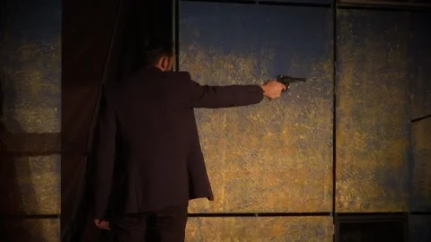 A man fires a revolver. Stock Footage 145707025