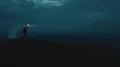 The man with a firestick standing on the mountain top 4k or 4k+ Resolution