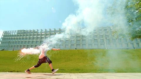 A man with a fireworks in his hands Stock Photos