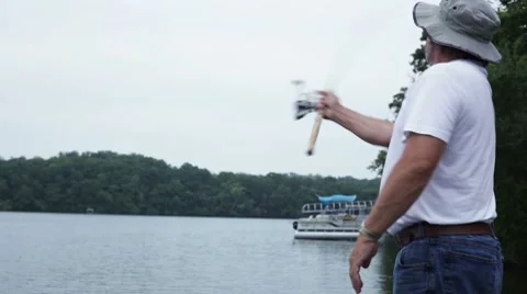 Man fishing off of a dock. Stock-Footage 8653484
