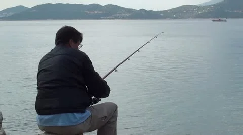 Man fishing Stock Footage 10836660