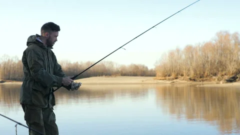 The man is fishing. Stock Footage 97343354