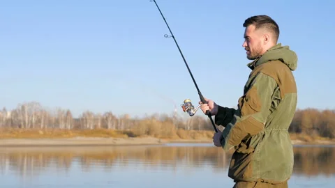The man is fishing. Stock Footage 97343580
