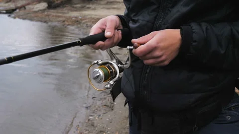 The man is fishing. Stock Footage 97386899