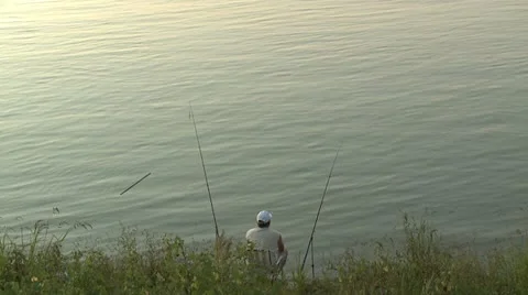 Man fishing on river Stock Footage 10855558