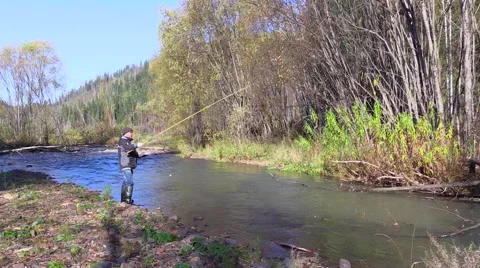 Man is fishing on river Video stock 42805439