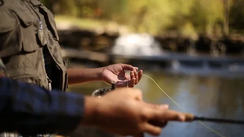 Man fishing in river Stock Footage 80157487