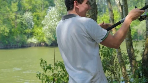 Man fishing in river Stock Footage 82723916