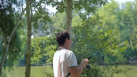 Man fishing in river Stock Footage 82724663