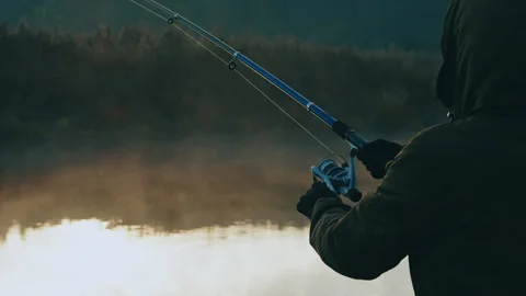 Man fishing in the river Stock Footage 177955146