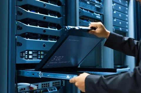 Man fix server network in data center room Stock Photos