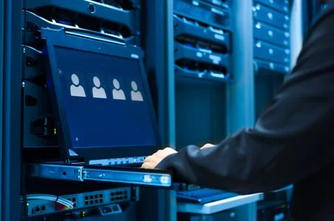 Man fix server network in data center room Stock Photos