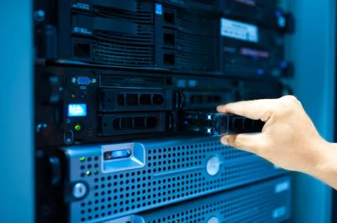 Man fix server network in data center room Stock Photos