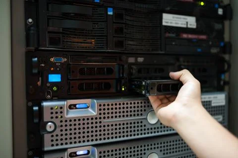 Man fix server network in data center room Stock Photos