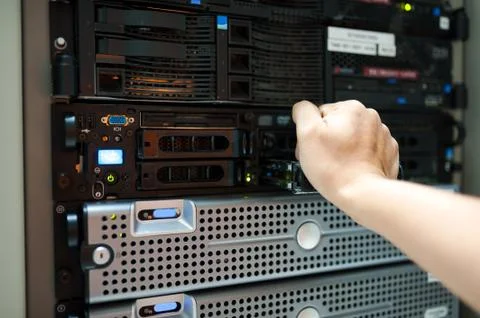Man fix server network in data center room Stock Photos