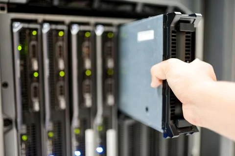 Man fix server network in data center room Stock Photos